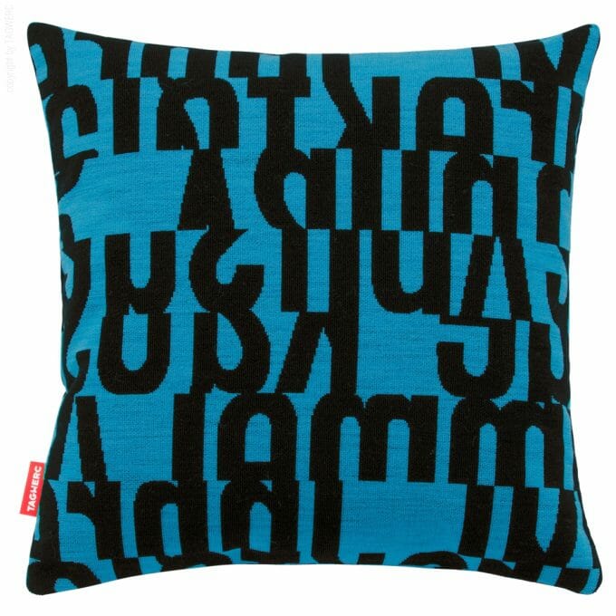 The cushion by TAGWERC with the letters pattern in black and aqua by designer Gunnar Aagaard Andersen.